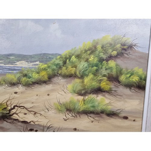 56 - A large original oil on canvas of a beach scene signed A.H Nordbery, the painting has a small hole i... 