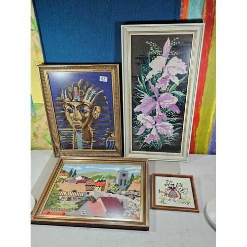 61 - 4x framed and glazed needlework pictures to include a white framed image of purple flowers, a gilt f... 
