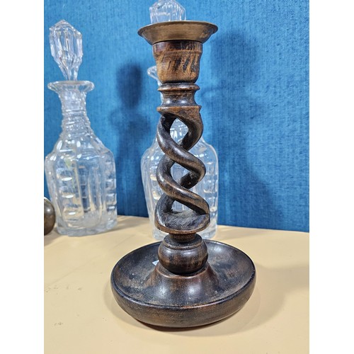125 - A quantity of collectables to include a pair of barley twist wooden candlesticks and a pair of cut g... 