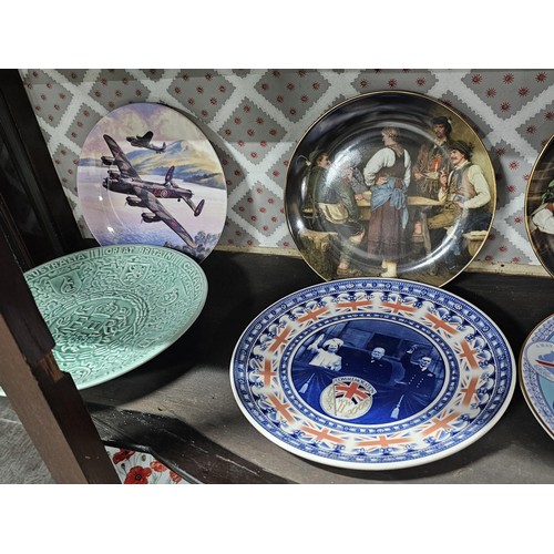 127 - A large collection of picture plates by Wedgwood and Royal Doulton of various designs to include air... 