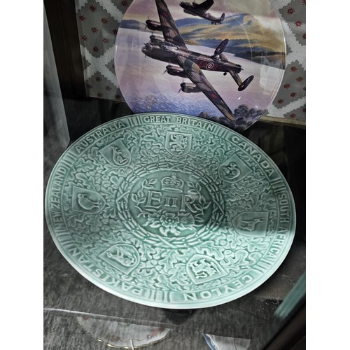 127 - A large collection of picture plates by Wedgwood and Royal Doulton of various designs to include air... 