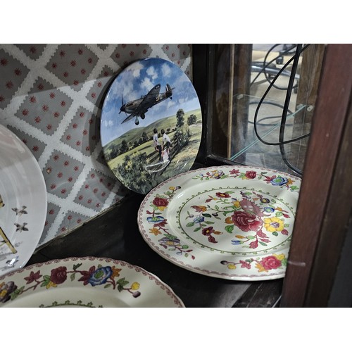 127 - A large collection of picture plates by Wedgwood and Royal Doulton of various designs to include air... 