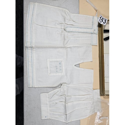 153 - A boxed vintage set of ladies gloves and glove stretchers in ebony along with handkerchiefs, a lace ... 