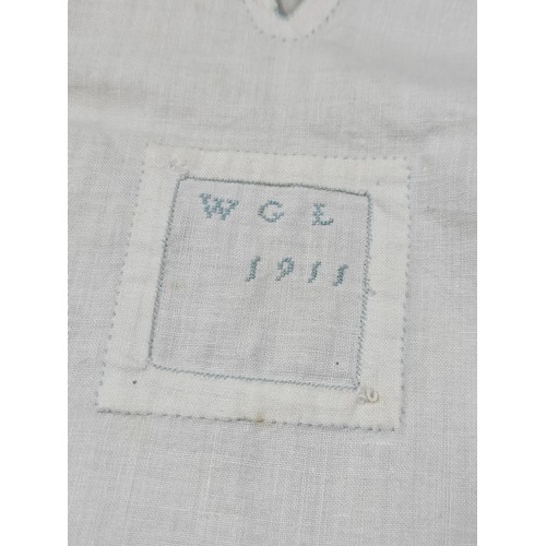 153 - A boxed vintage set of ladies gloves and glove stretchers in ebony along with handkerchiefs, a lace ... 