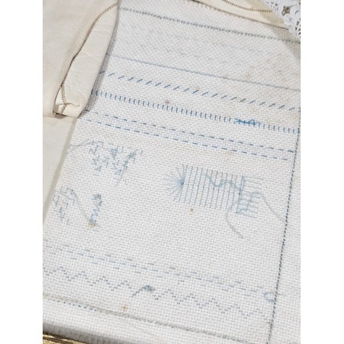 153 - A boxed vintage set of ladies gloves and glove stretchers in ebony along with handkerchiefs, a lace ... 