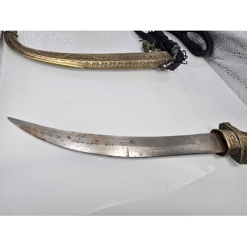 364 - A vintage ornate Middle Eastern/North African curved dagger, likely a Jambiya type ceremonial knife ... 