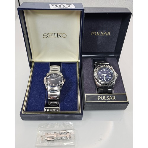 387 - 2x good quality cased gents wrist watches to include a Pulsar Solar Diver 200M wristwatch Model V145... 