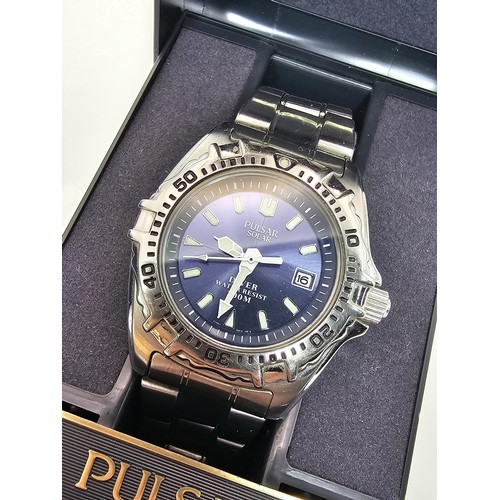 387 - 2x good quality cased gents wrist watches to include a Pulsar Solar Diver 200M wristwatch Model V145... 