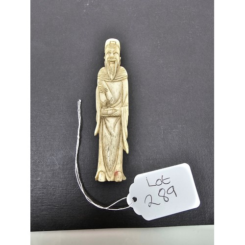 289 - A very well carved bone figure of an Asian man it presents excellent carving throughout. The figure ... 