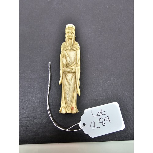 289 - A very well carved bone figure of an Asian man it presents excellent carving throughout. The figure ... 