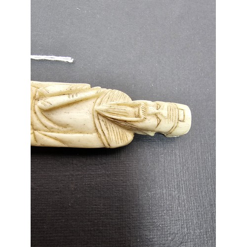 289 - A very well carved bone figure of an Asian man it presents excellent carving throughout. The figure ... 