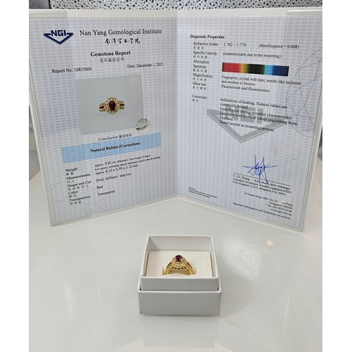 406 - A fine quality 18ct Gold Ruby & Diamond Halo Ring. Claw set with an oval cut natural Ruby weighing 0... 