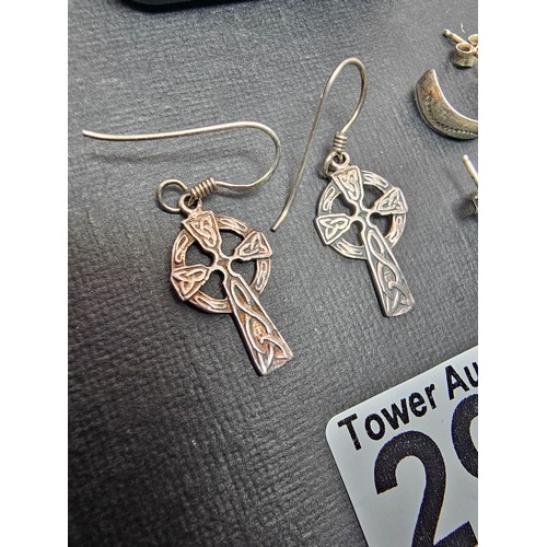 291 - 2x pairs of 925 Silver earrings to include a pair of drop earrings with a Celtic Cross design and a ... 
