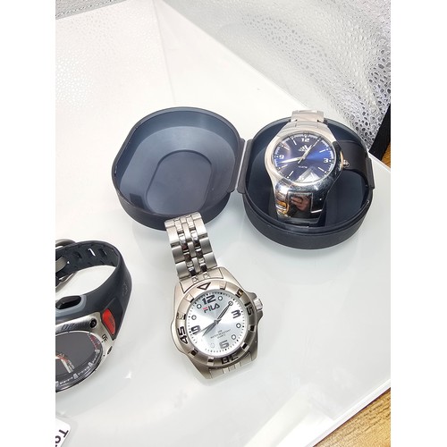 295 - A collection of 4x Sports Wristwatches to include an attractive Chrome Adidas cased wristwatch, a Ti... 