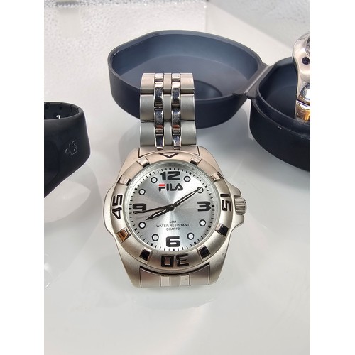 295 - A collection of 4x Sports Wristwatches to include an attractive Chrome Adidas cased wristwatch, a Ti... 