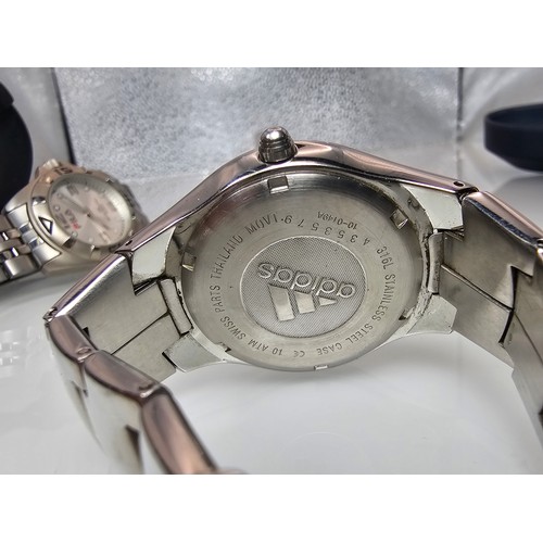 295 - A collection of 4x Sports Wristwatches to include an attractive Chrome Adidas cased wristwatch, a Ti... 