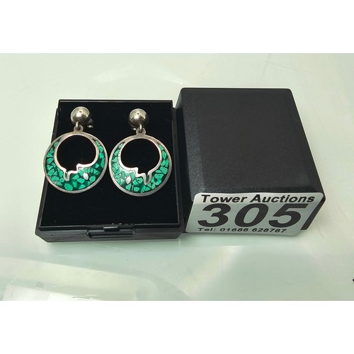 305 - A pair of pretty 925 Silver Mexico drop earrings of good quality featuring disc shaped drops with a ... 