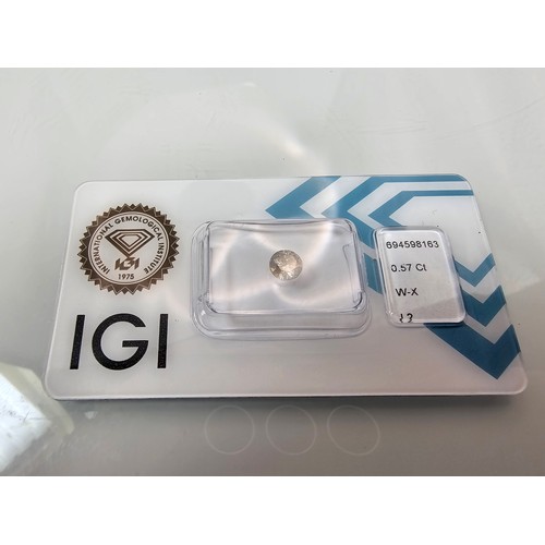 396 - A 0.57ct natural round brilliant round diamond gemstone with full diamond report by IGI. The diamond... 