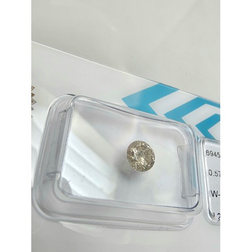 396 - A 0.57ct natural round brilliant round diamond gemstone with full diamond report by IGI. The diamond... 