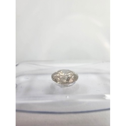 396 - A 0.57ct natural round brilliant round diamond gemstone with full diamond report by IGI. The diamond... 