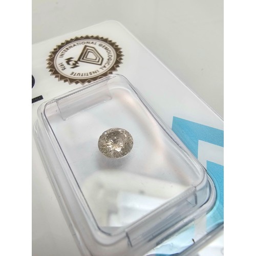 396 - A 0.57ct natural round brilliant round diamond gemstone with full diamond report by IGI. The diamond... 