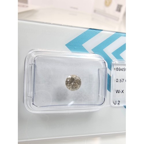 396 - A 0.57ct natural round brilliant round diamond gemstone with full diamond report by IGI. The diamond... 