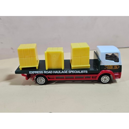 167 - A small collection of Eddie Stobart diecast vehicles to include a curtain side lorry with spare curt... 