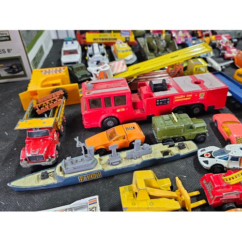 173 - A very large collection of diecast vehicles of various brands including Dinky Corgi and Matchbox veh... 