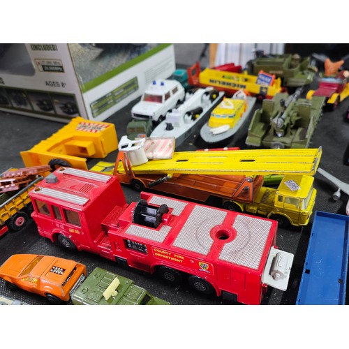 173 - A very large collection of diecast vehicles of various brands including Dinky Corgi and Matchbox veh... 
