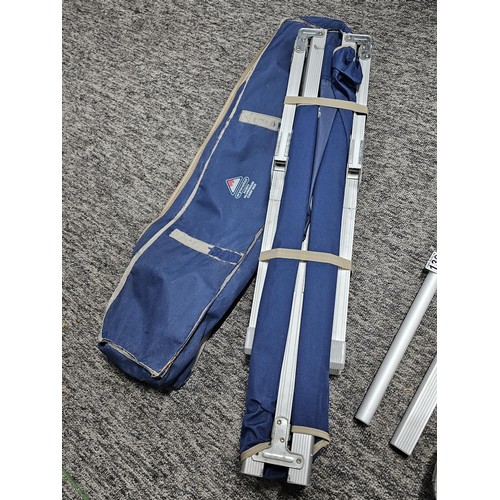 139 - A good quality Wynnster aluminium camp bed in good order complete with carry case