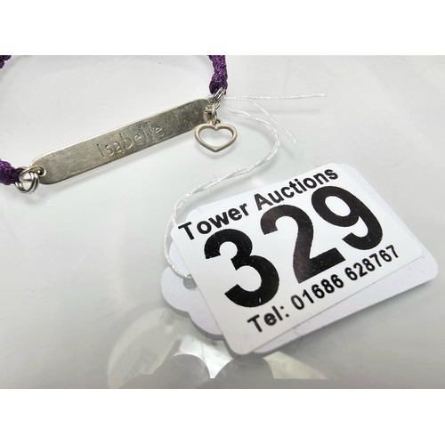 329 - A braided cord 925 Silver length adjustable bracelet having a 925 Silver plaque marked Isabelle with... 