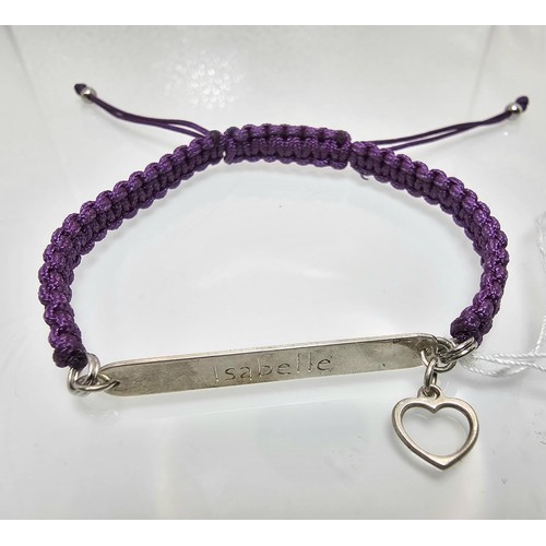 329 - A braided cord 925 Silver length adjustable bracelet having a 925 Silver plaque marked Isabelle with... 