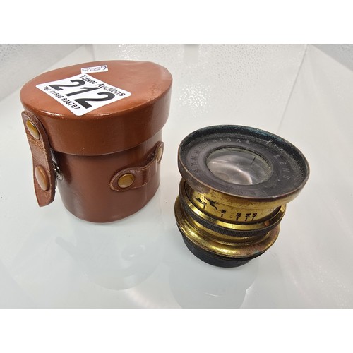 274 - A late 19th century antique Beck symmetrical brass camera lens complete with its original leather ca... 