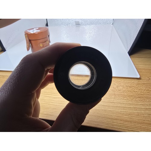 274 - A late 19th century antique Beck symmetrical brass camera lens complete with its original leather ca... 