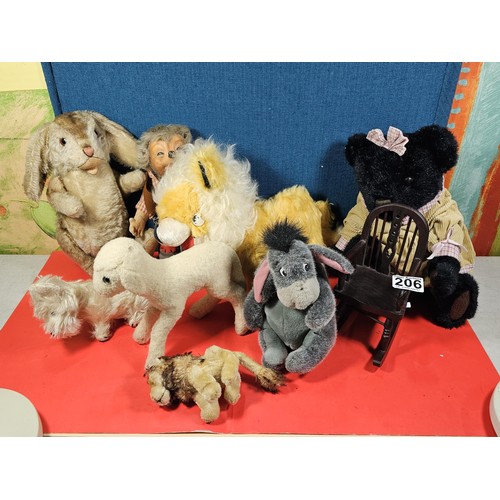 206 - A selection of soft toys A Merry Thought original lion plush teddy with the stamp to the base along ... 