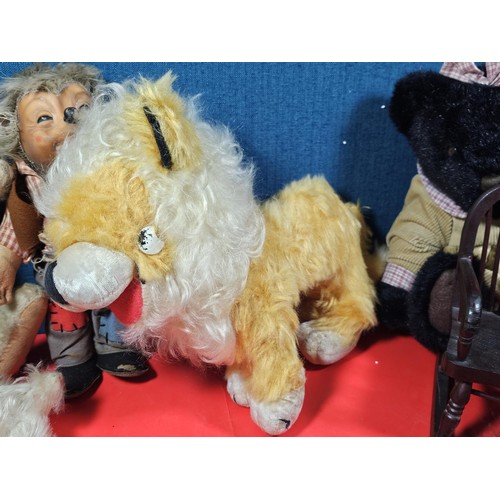 206 - A selection of soft toys A Merry Thought original lion plush teddy with the stamp to the base along ... 