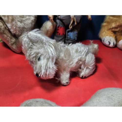 206 - A selection of soft toys A Merry Thought original lion plush teddy with the stamp to the base along ... 