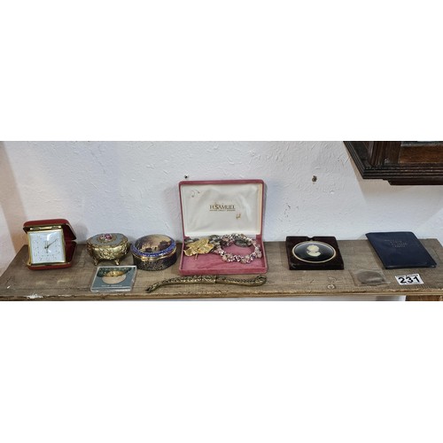 231 - A small quantity of collectables to include 2x lidded trinket boxes both in metal one with a ceramic... 