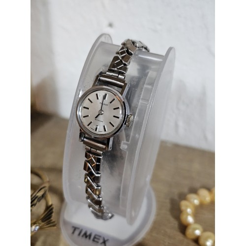 232 - A small quantity of costume jewellery to include beaded necklaces, a metal bracelet with enamel pict... 