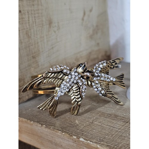 232 - A small quantity of costume jewellery to include beaded necklaces, a metal bracelet with enamel pict... 