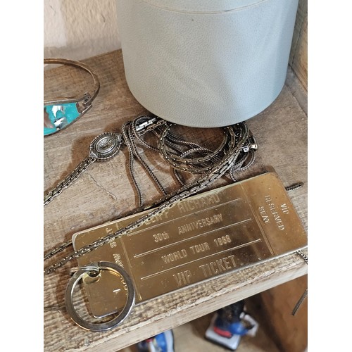 232 - A small quantity of costume jewellery to include beaded necklaces, a metal bracelet with enamel pict... 