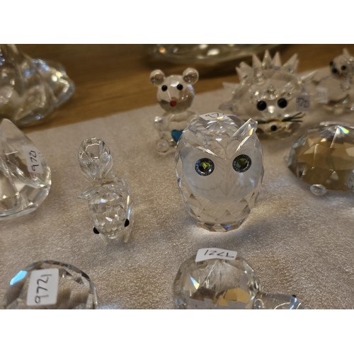 244 - A large collection of glass figures all hand made covering various birds and animals to include an h... 