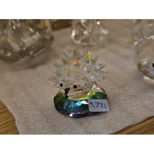 244 - A large collection of glass figures all hand made covering various birds and animals to include an h... 