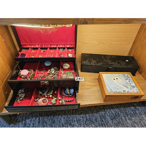 247 - Collection of 3x jewellery boxes to include a cantilever jewellery box with three layers of assorted... 
