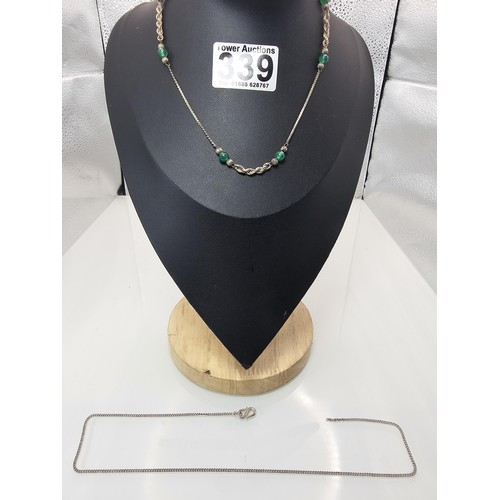 339 - 2x 925 Silver necklaces to include an interesting silver necklace with an middle eastern design feat... 