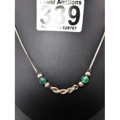 339 - 2x 925 Silver necklaces to include an interesting silver necklace with an middle eastern design feat... 