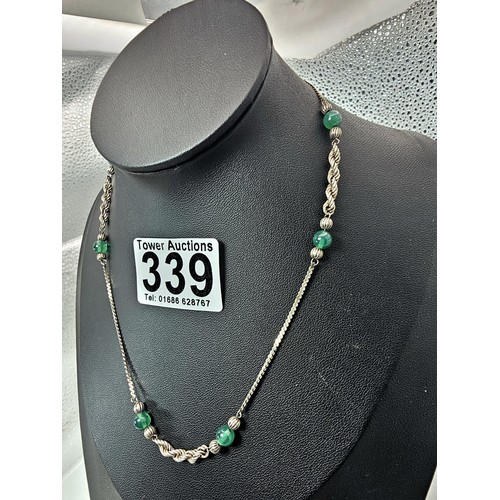 339 - 2x 925 Silver necklaces to include an interesting silver necklace with an middle eastern design feat... 
