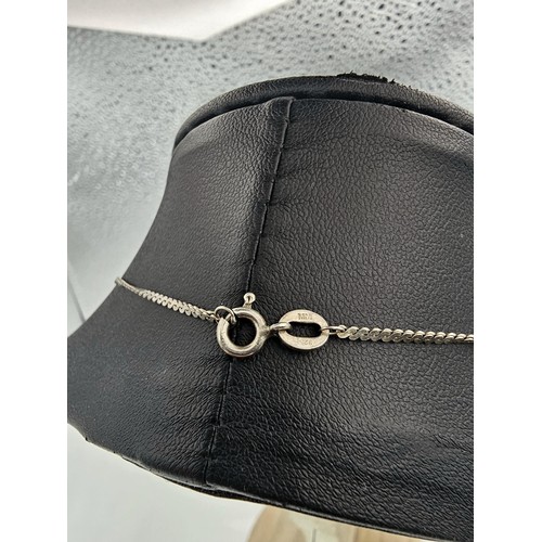 339 - 2x 925 Silver necklaces to include an interesting silver necklace with an middle eastern design feat... 