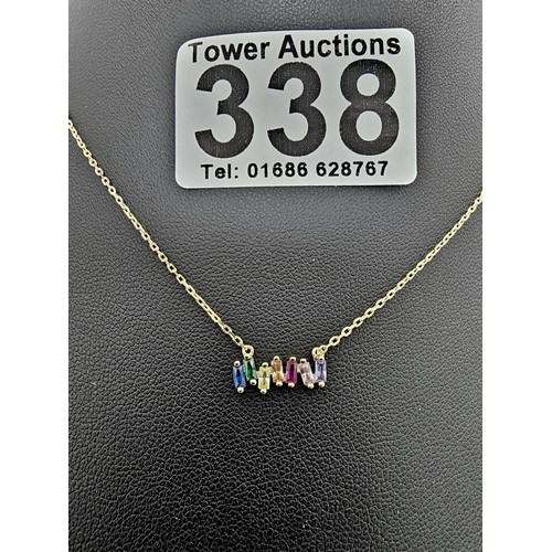 338 - An as new gold on 925 silver pretty necklace set with seven genuine baguette cut gemstones to includ... 