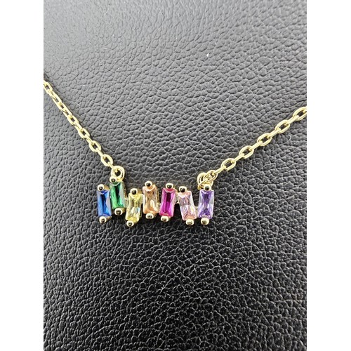 338 - An as new gold on 925 silver pretty necklace set with seven genuine baguette cut gemstones to includ... 